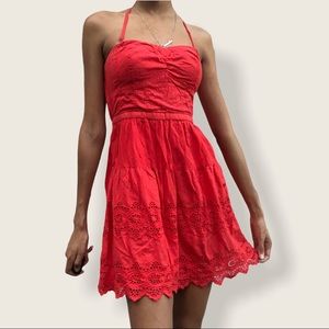 orangey-red halter dress
